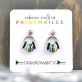 Small demiromantic pride chainmaille stud earrings on a white card. Each earring has a stainless steel ball with a steel link and 7 smaller links in the colors of the demiromantic pride flag - black, 2 grey, green, 2 white and black